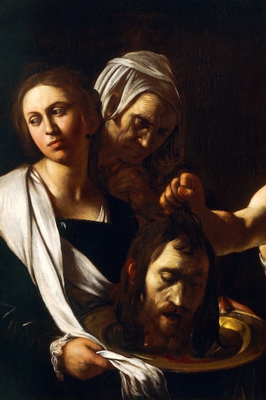 An oil painting by Michelangelo Caravaggio, in his typical style of high contrast dramatic light, depicting Salome receiving the severed head of John the Baptist